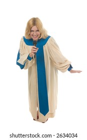 Blond Woman In A Choir Robe Holding A Microphone And Singing.