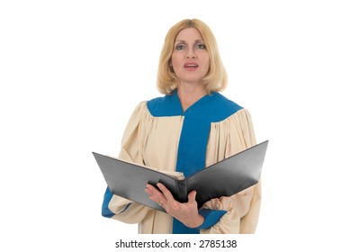 Blond Woman In A Choir Robe Holding A Music Notebook And Singing.