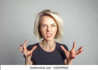 Blond Woman Growls In Fury. Emotion Concept