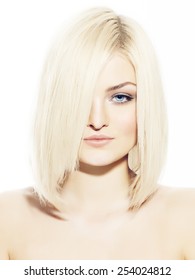 Blond Woman With Short Sleek Hair.