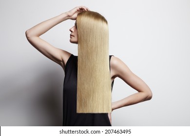 Blond Woman Showing Ideal Hair