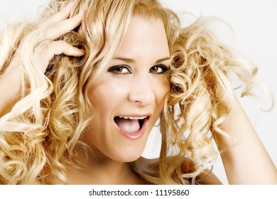 Blond Young Beautiful Female Having A Bad Hair Day