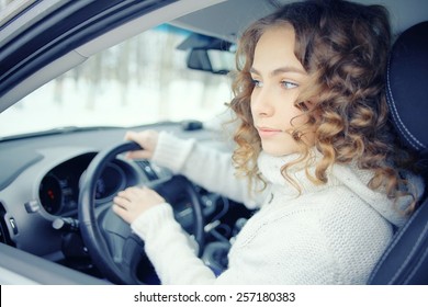 blonde behind the wheel of a portrait