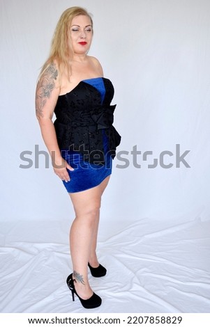Blonde beutiful model tattoo piercing alternative full leight isolated white background dark back clothes party dress vintge  braided hair smiling expressive laugning confident plus size pretty girl