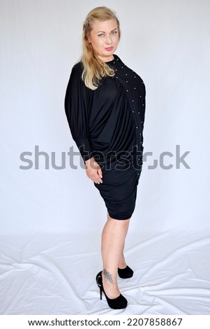 Blonde beutiful model tattoo piercing alternative full leight isolated white background dark back clothes party dress vintge  braided hair smiling expressive laugning confident plus size pretty girl
