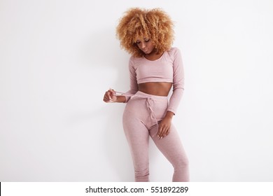 Blonde Black Woman Wears Pajamas In Studio Shoot