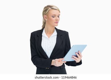 Blonde Businesswoman Looking At Her Tablet