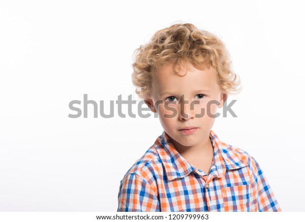 Blonde Curly Haired Little Boy Serious Stock Photo Edit Now