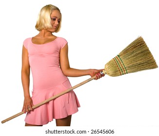 blonde in dress and broom
