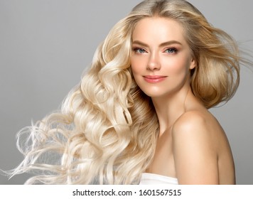 Blonde face woman curly hair beauty face natural makeup 