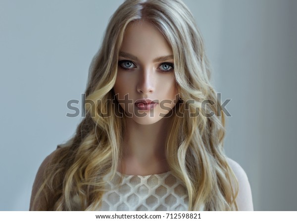 Blonde Fashion Girl Long Shiny Curly Stock Photo Edit Now 712598821