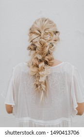 Blonde Girl With Elaborate Fishtail Braid