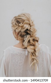 Blonde Girl With Elaborate Fishtail Braid