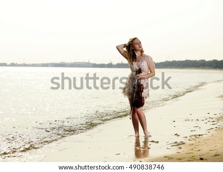 Similar – woman on the beach