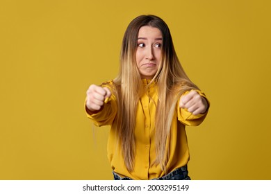 Blonde Girl Pretending To Ride A Car