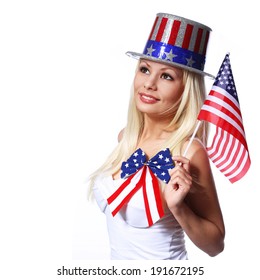 Blonde Girl Waving Small American Flag Isolated On White. Independence Day. Patriotic Young Woman