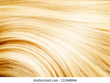 Blonde Hair. Blond Hair Texture, Close-up. Beautiful Healthy Long Curly Blonde Hair Close-up Texture. Dyed Smooth White Hair Background, Coloring, Extensions, Cure, Treatment Concept