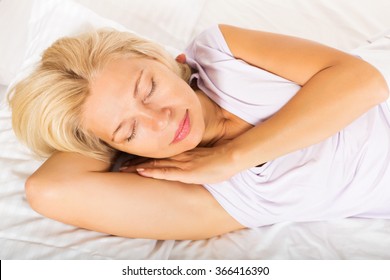 tanned mature sleeping Tanned mature sleeping