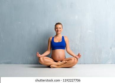 Blonde Pregnant Woman Doing Yoga