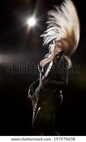 Blonde Sexy Woman Playing Bass Guitar Stock Photo (Edit Now) 197970638