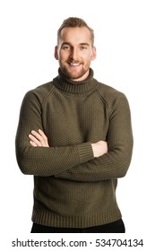 Blonde Smiling Man Wearing A Green Turtle Neck Sweater Standing Against A White Background Feeling Great.