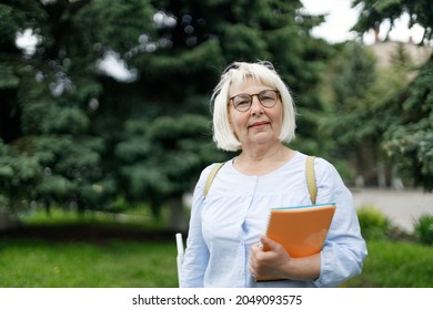 Blonde Teacher Woman Lady 40s 50s Years Old Wearing Eyeglasses Standing Hold Notepads Looking Camera Outdoors