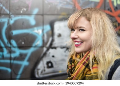 Blonde Urban Teen Girl Against Grafitti Wall. Street Style