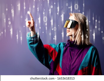 Blonde in VR glasses with binary code around