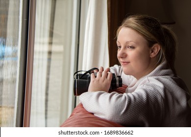  Blonde White Female Nosy Neighbour, Looking Out Of A Window Holding Binoculars. 