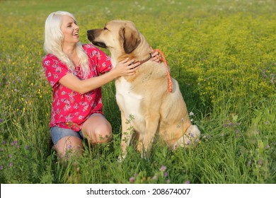 Blonde Woman With Big Mastiff Dog