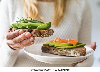 Blonde Woman Eating Healthy Breakfast, Avocado Toast, Isolated