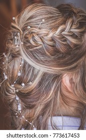 Blonde Woman With French Braid Hairstyle Wedding Hairdo With Pins And Curls Back View