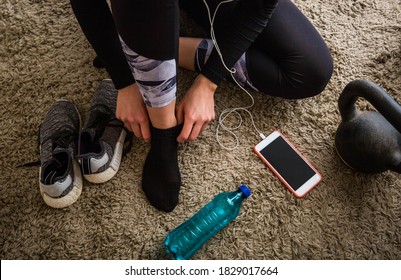 Blonde Woman Getting Dressed For Workout