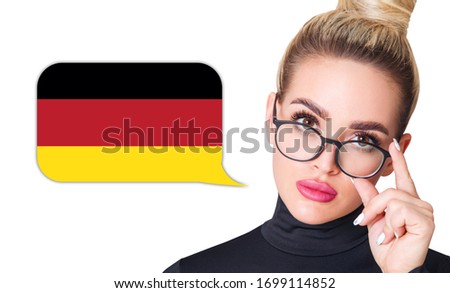 Blonde woman in glasses near dialogue frame with german flag. Speak language concept.