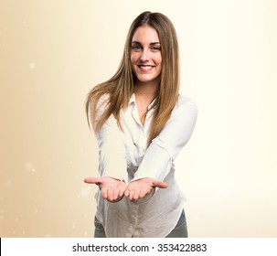 Blonde Woman Holding Something 