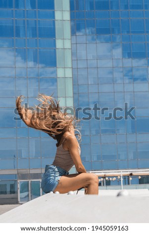 Similar – Foto Bild fröhliche Frau mit langen Haaren und Kopfhörern, Tänze