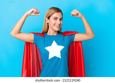 Blonde woman over isolated background in superhero costume and doing strong gesture