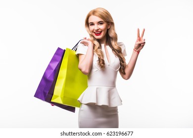 Blonde Woman With Shopping Bags. Studio Shoot