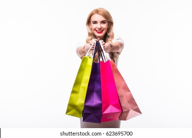 Blonde Woman With Shopping Bags. Studio Shoot