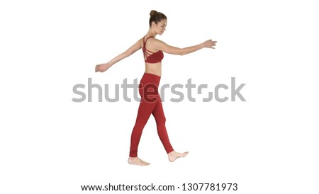 The blonde yoga instructor walking and waving her hands on white background.