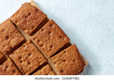 Blondie Brownie Dessert Bars With Chocolate Chips, Overhead Flat Lay Shot With A Place For Text