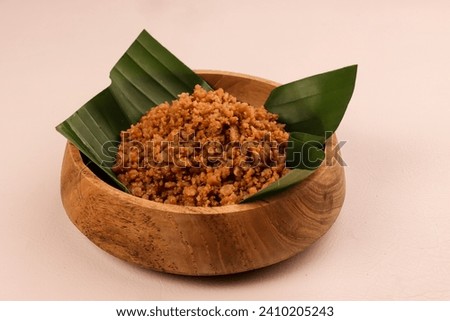 Blondo is the Dregs of Coconut Milk Which is Cooked Until it Releases Oil In The Form of Small Lumps. 
