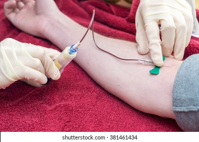 Blood Being Drawn From A Patients Arm