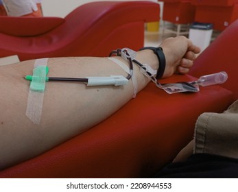 Blood Donation, Blood Transfusion, Check Specified, Fasting, Health Care. Left Arm Of Caucasian Young Man With Equipment For Blood Or Plasma Donations In Donation Centre. Blood Donation Concept. Plasm