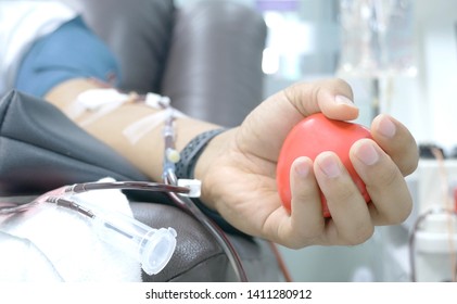 Blood Donation Or Transfusion With A Heart Ball Holding In Hand ,latelets Blood Separation Machine Working,Platelet  Donation,Blood Donation,selective Focus.