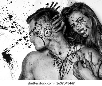 Blood Is Flowing Down The Neck, Bite Marks Are Visible. Sexy Woman Vampire Bites A Man's Neck. Woman With Red Blood And With Blond Hair. Killer, Maniac. Desire, Thirst Concept