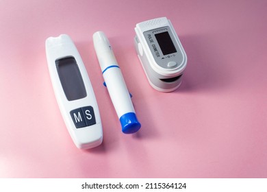 A Blood Glucose Meter For Measuring Blood Sugar And A Pulse Oximeter For Measuring Blood Oxygen Levels.