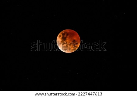 A Blood Moon during the Lunar Eclipse in the night sky. Taken at Macmasters Beach, NSW, Australia.