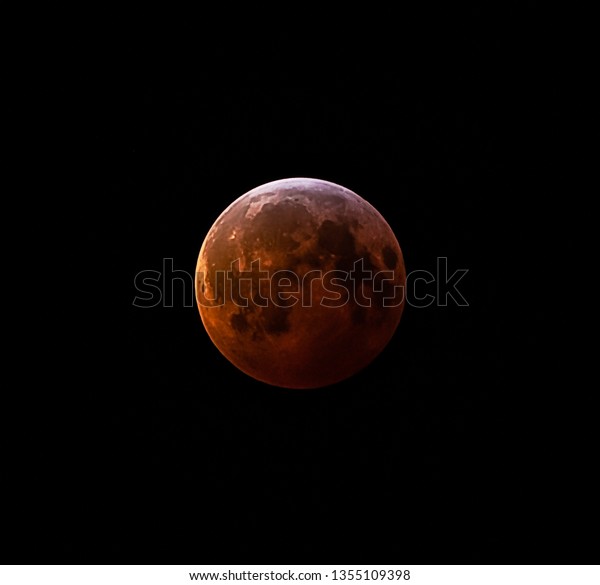 Blood moon during total\
lunar eclipse