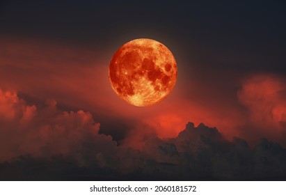 Blood Moon, Red moon, real full blood moon in black sky with cloud. Elements of this image furnished by NASA.